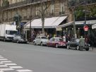  limousines de collection gares devant le caf de Flore